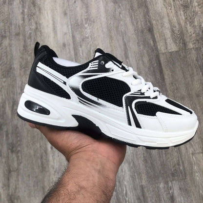 Sneaker Yenthe – Black & White PU Leather Sneakers for Women
